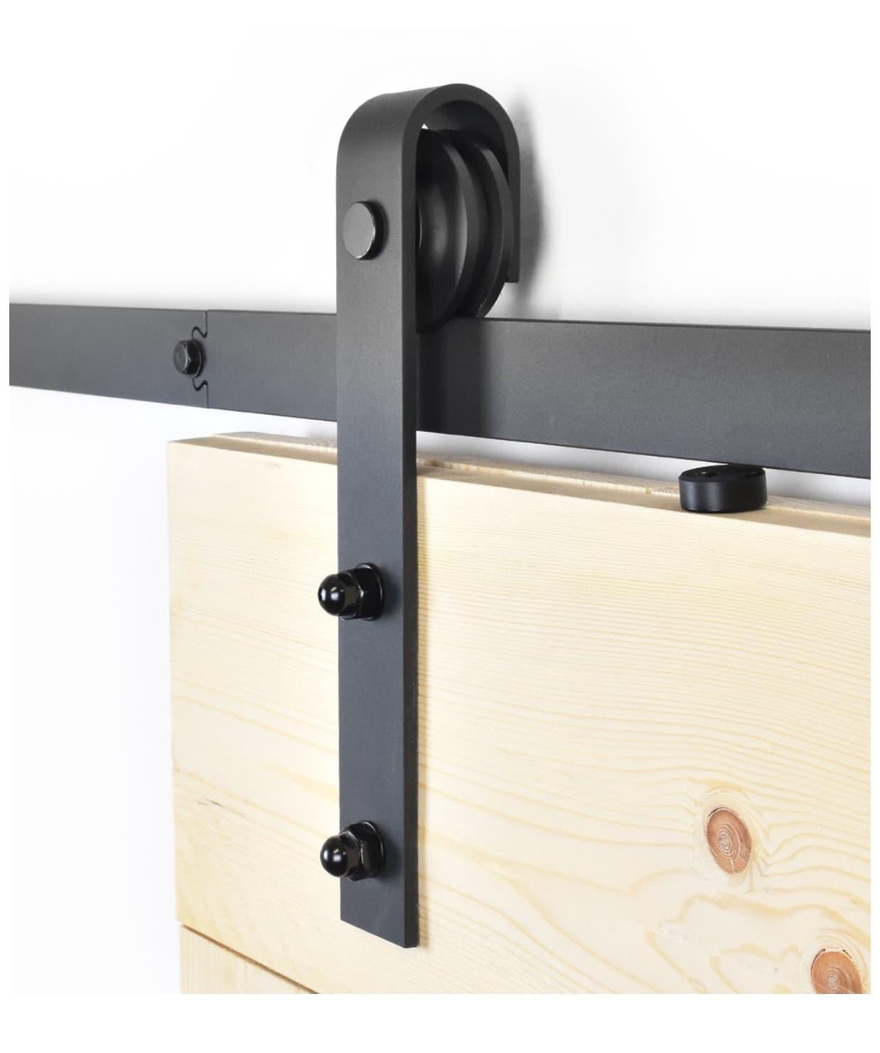 Zwart railsysteem van een industriële schuifdeur